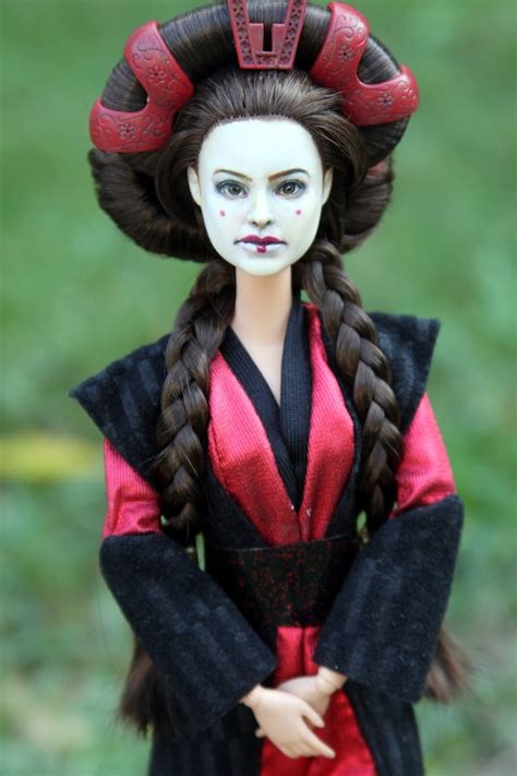 One of three Queen Amidala dolls, this one is titled Hidden Majesty Queen Amidala as it comes with her disguise as Padme. . Queen amidala doll
